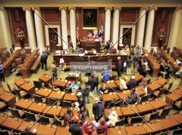 Visitors exploring the House of Representatives Chamber on the Capitol's 100th birthday