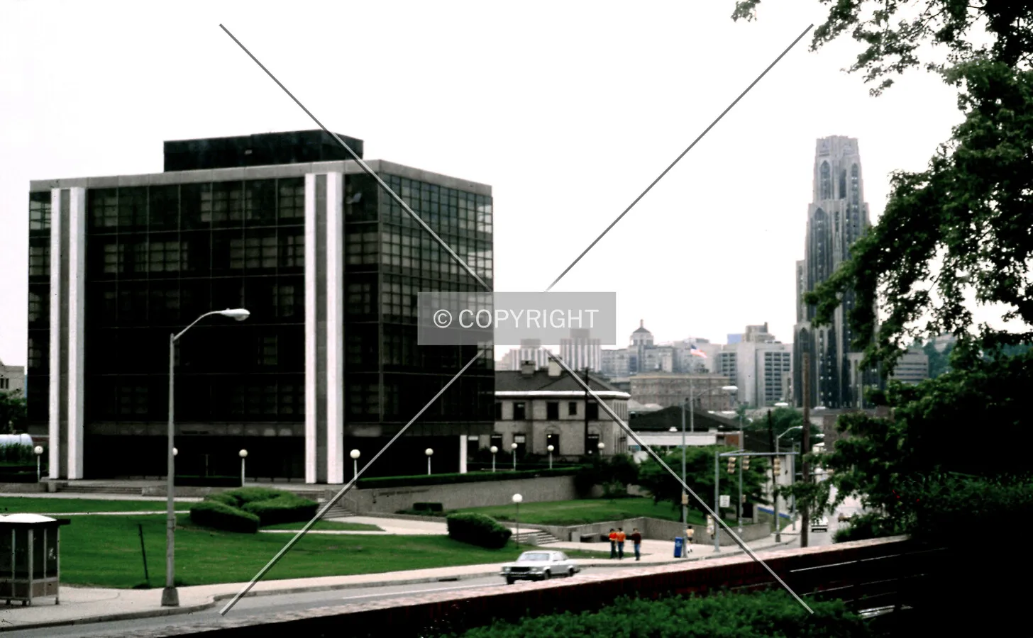 View from the east along Forbes Avenue with the University of Pittsburgh and Tower of Learning and in the background