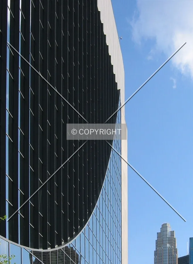The cable supporting the structure on the west facade