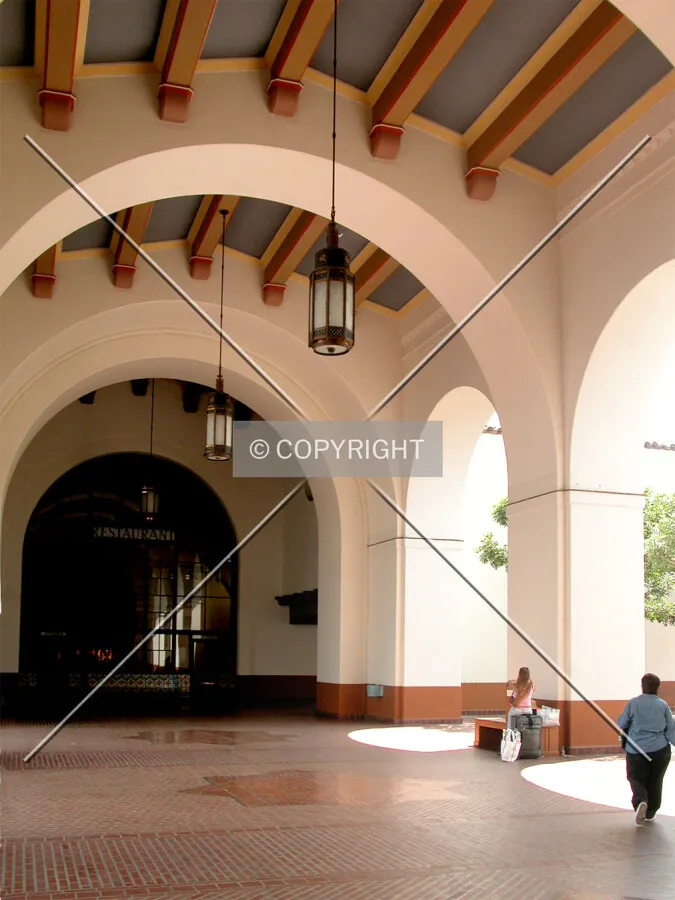 Spanish-style arches line the connection to the south wing