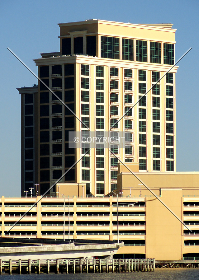 Full elevation of the Beau Rivage hotel tower from a pier to the west