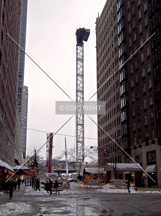 Looking west on Delaware Street which has been closed for assembly of the tower crane