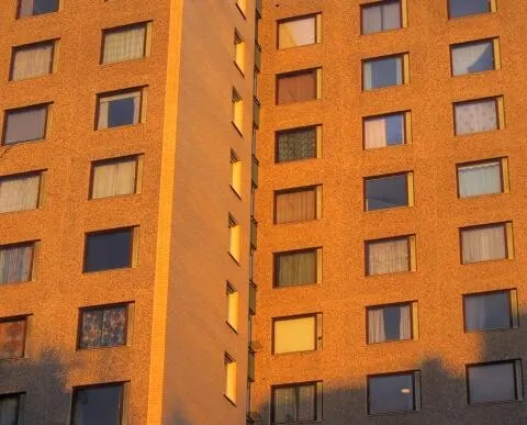 View of the monotonous facade at sunset