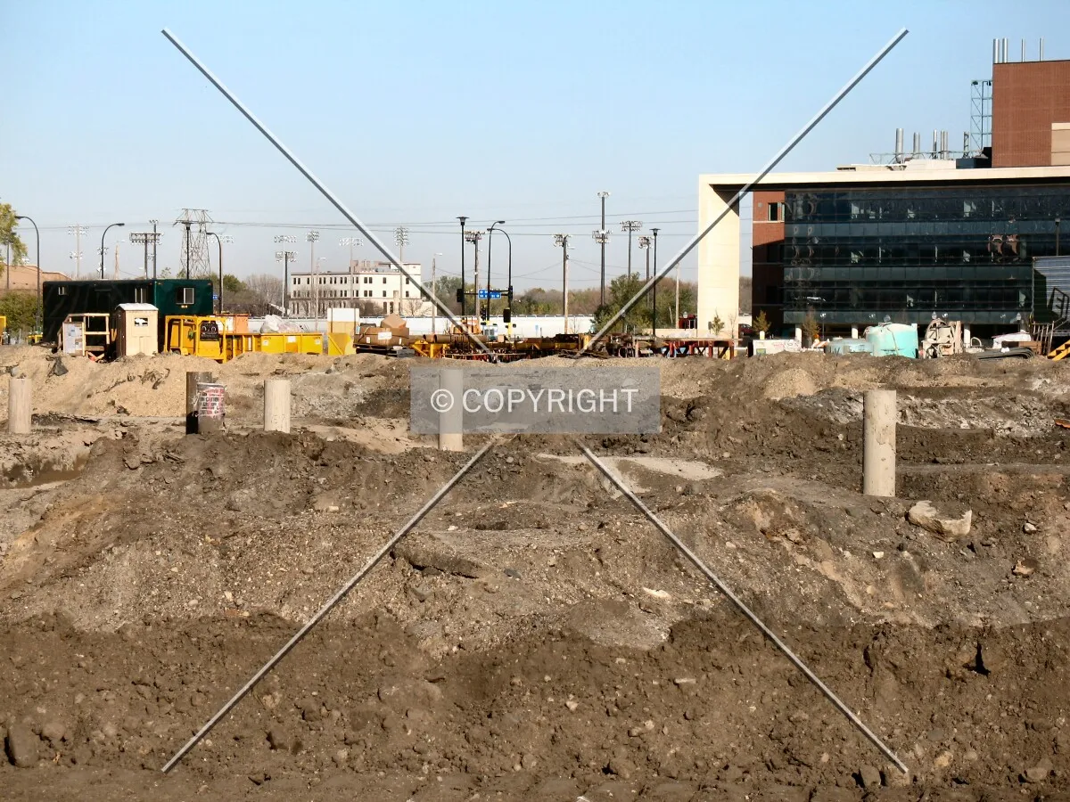 View across the site from the south, tops of foundation piles visible