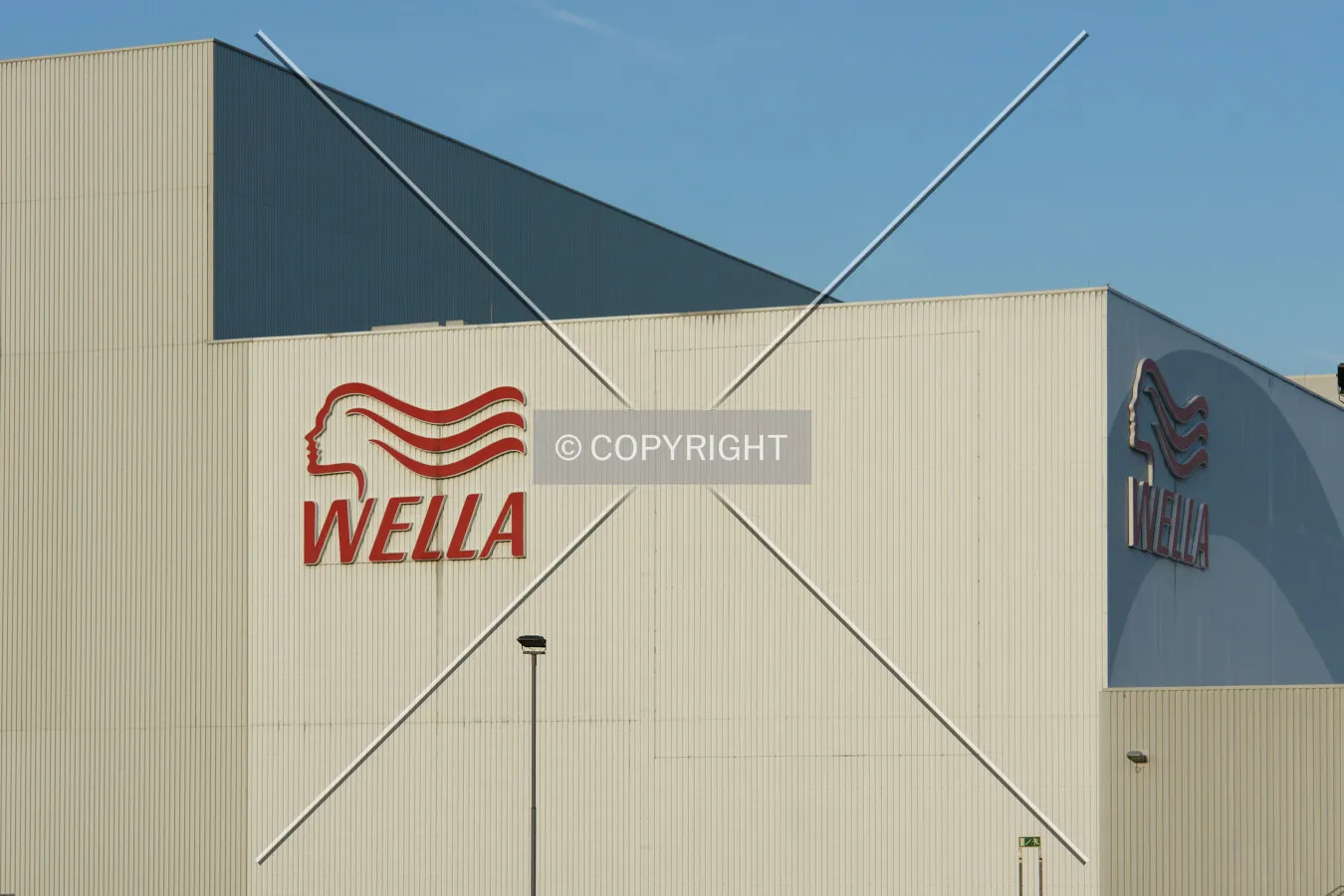 Warehouse buildings with Wella logos
