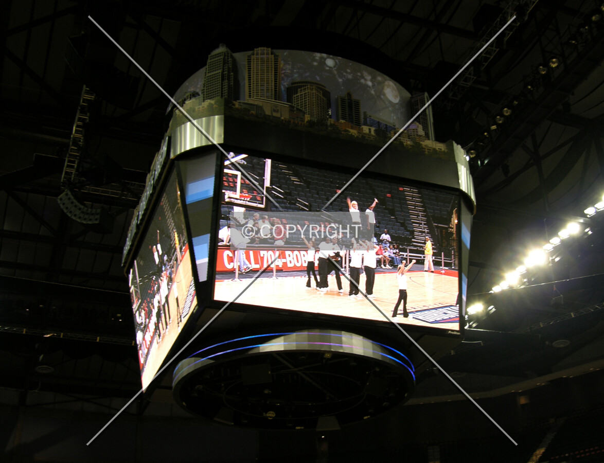 Looking up at the scoreboard from the court