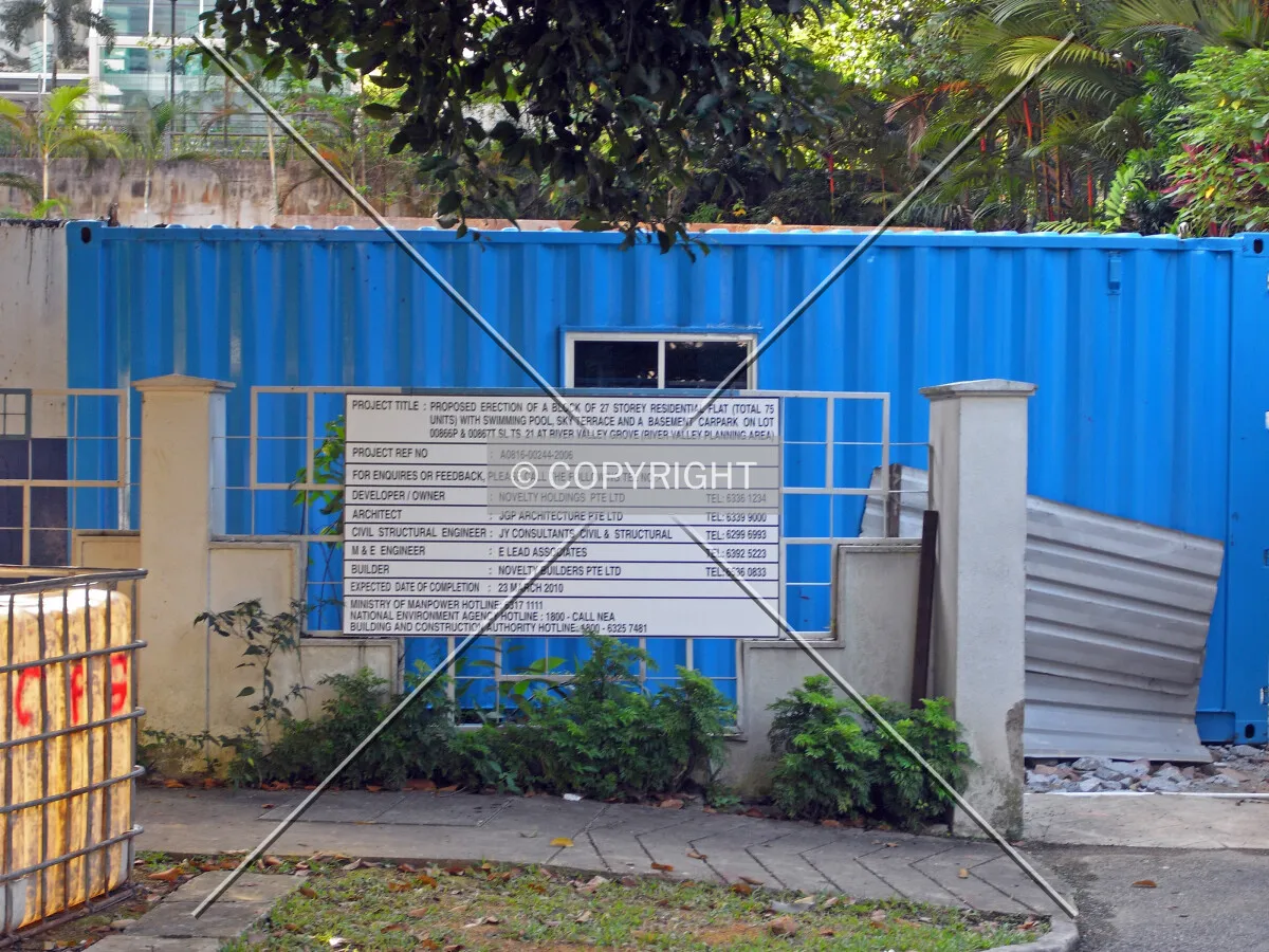 Project information displayed on the construction site fence