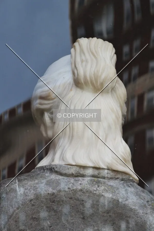 Spooky bust in a first floor window