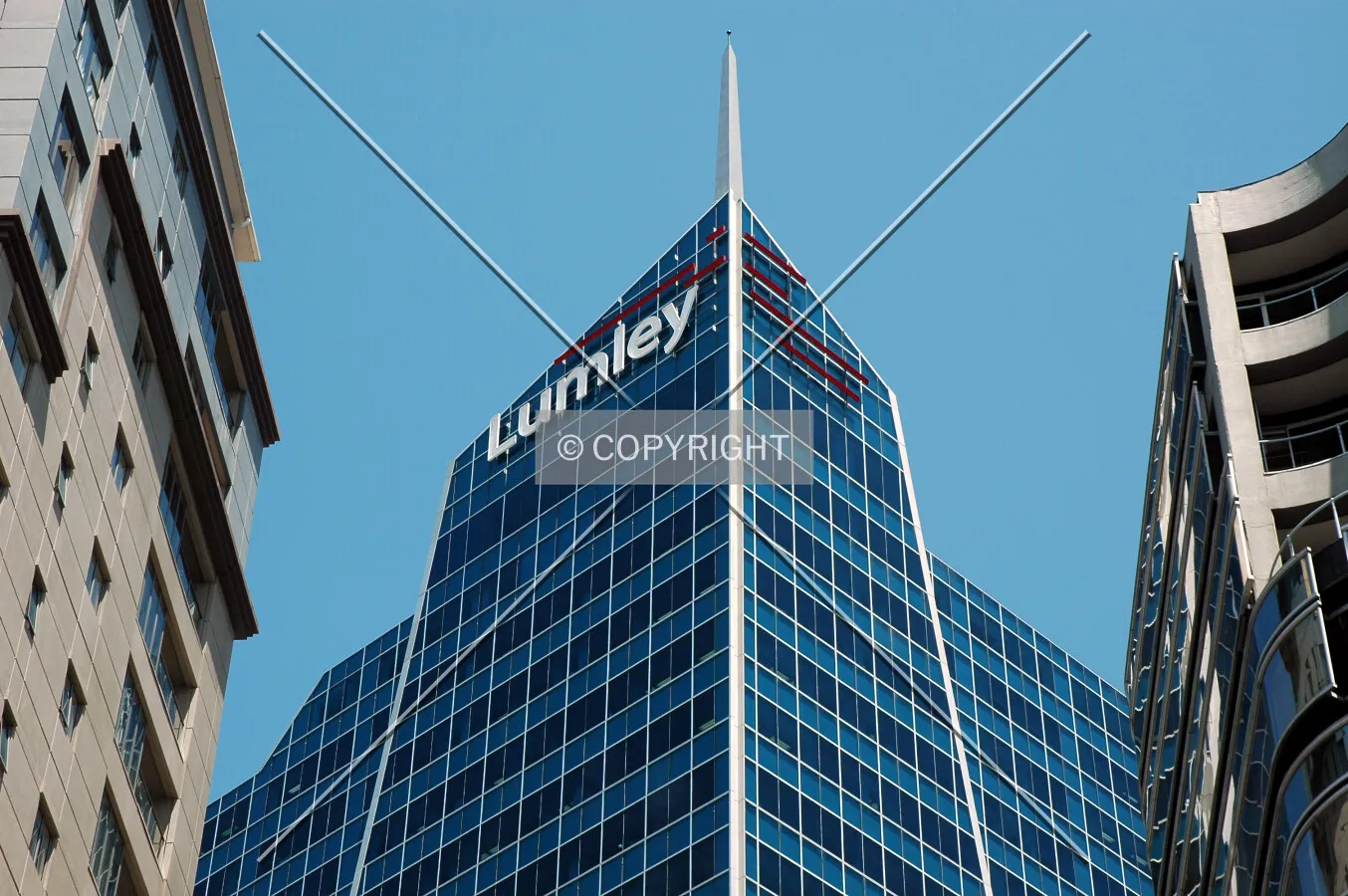 The northern spire pierces the sky from Quay Street