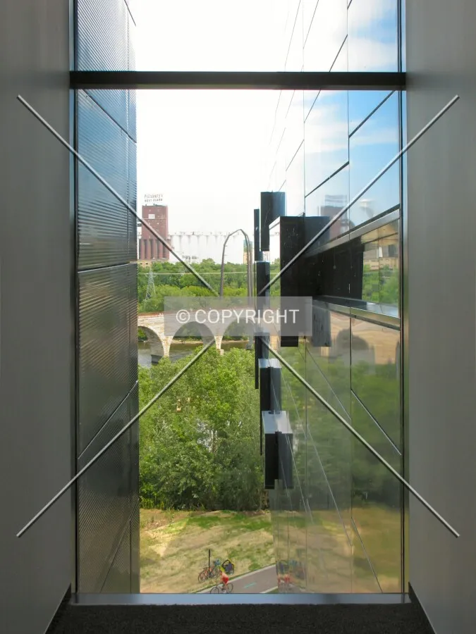 View to the north from a window in the Level 5 lobby near the Wurtele Thrust Stage; Endless Bridge extends on the right side, toward the Stone Arch Bridge