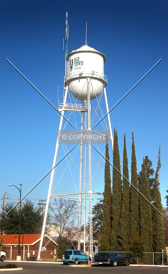 Water tower with the Old Town Clovis logo