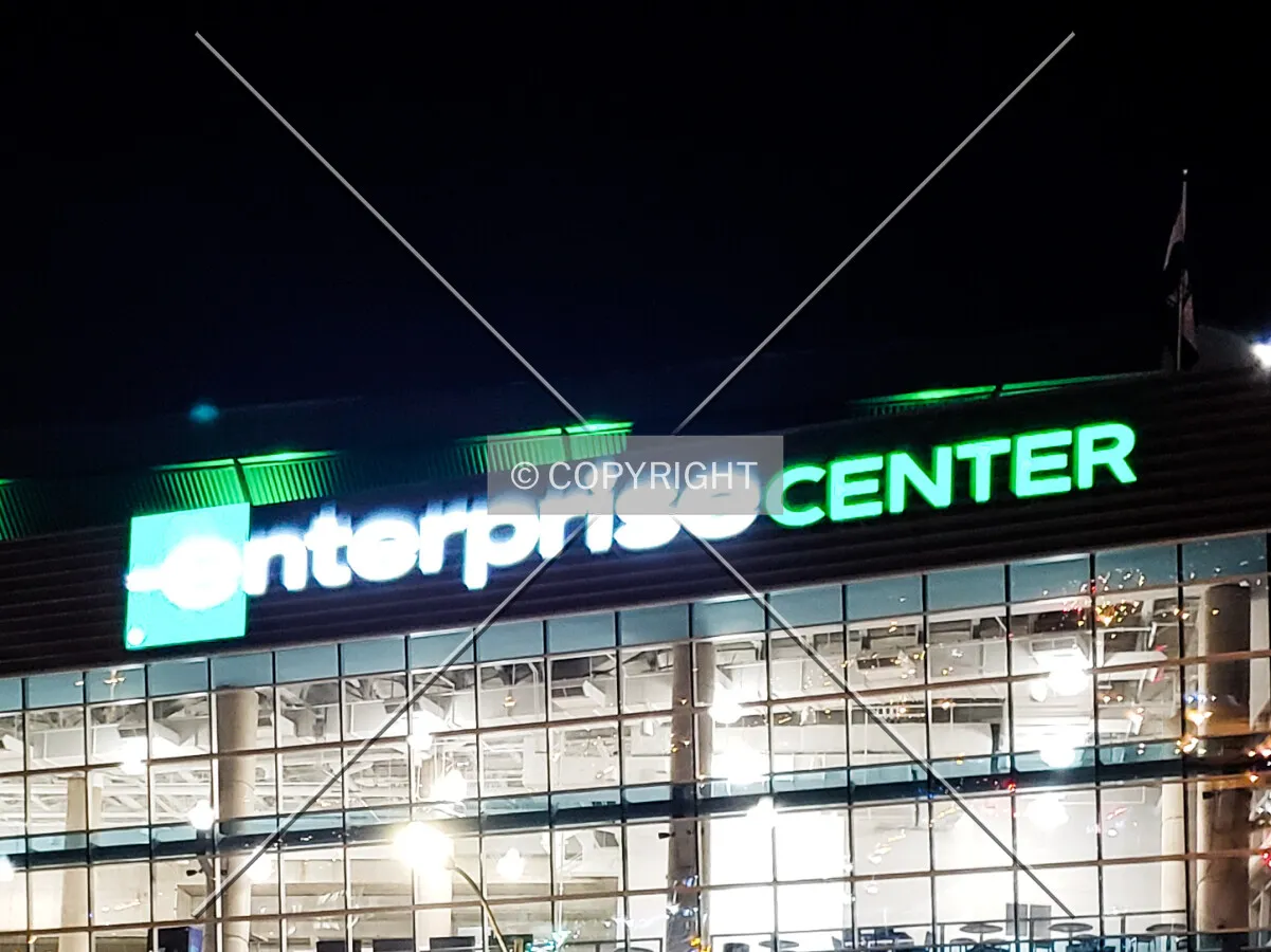 Sign illuminated at night; December 7, 2018