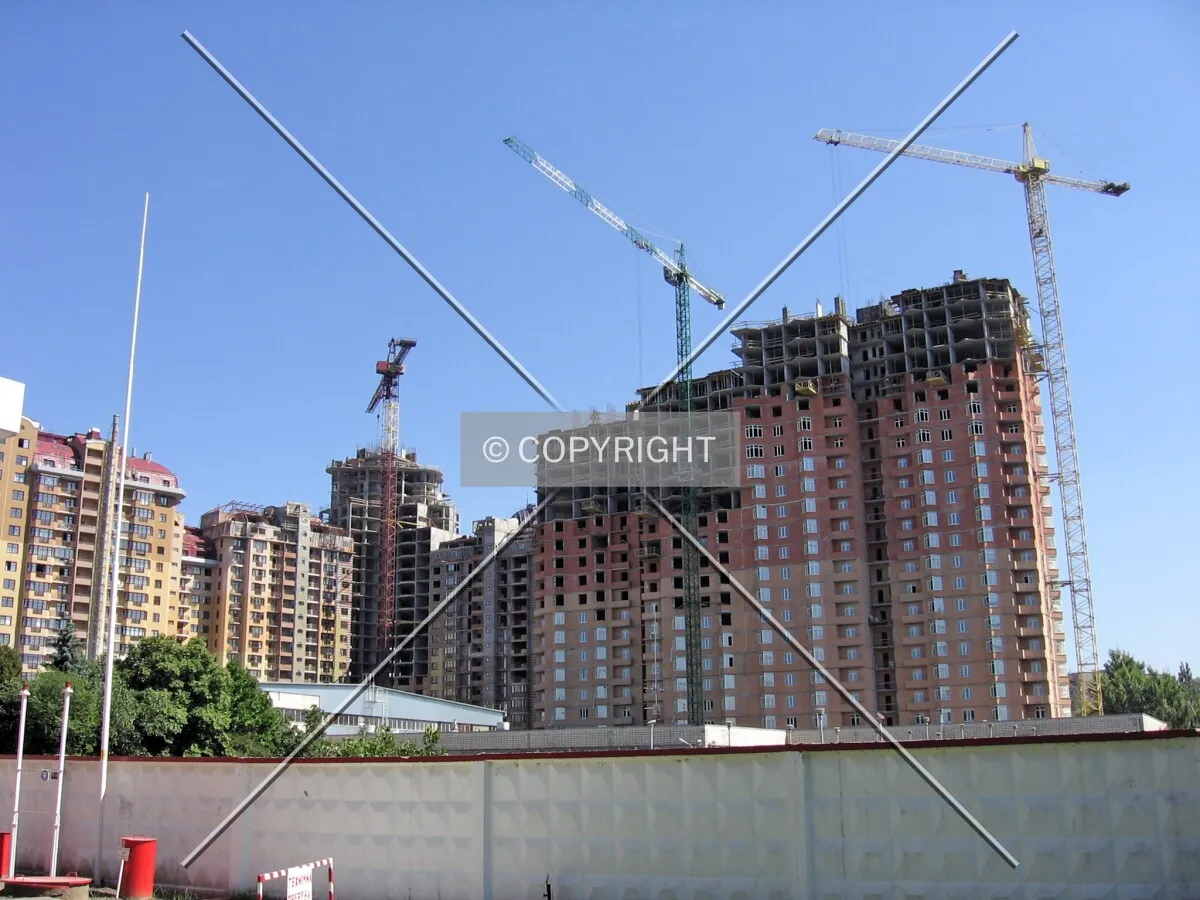 From left to right: completed block B, blocks C and D under construction