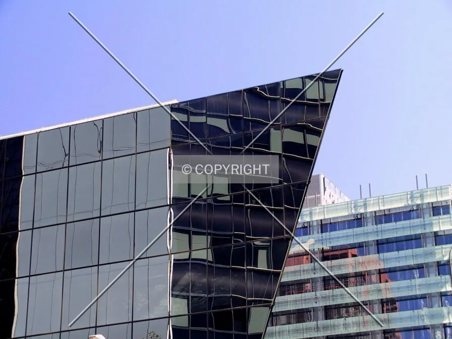 Glass-cladded annex on corner of Napoleon & Kent Street