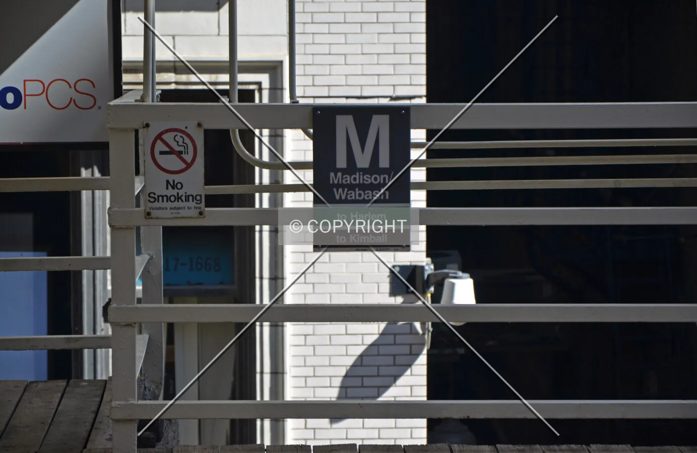 Station signage on the eastern platform; March 7, 2015.