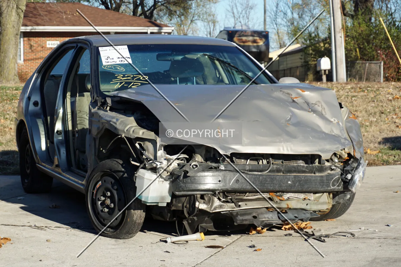 A damaged Nissan Altima; November 22, 2015