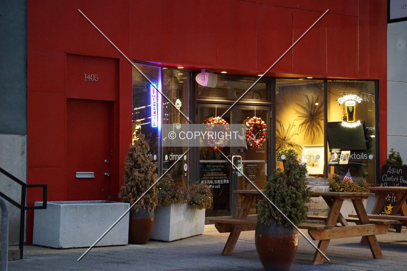 First floor storefront in the early evening; December 2, 2015