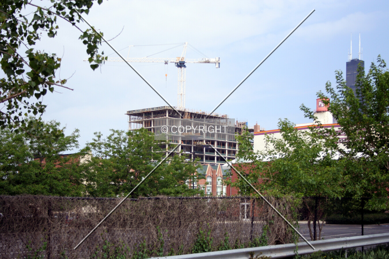 Looking northwest from the alley between Michigan and Wabash Avenues