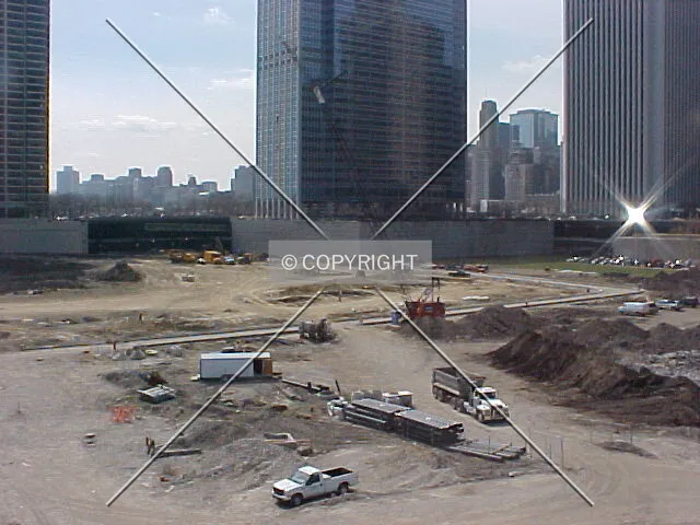 Looking southeast, with construction materials on site