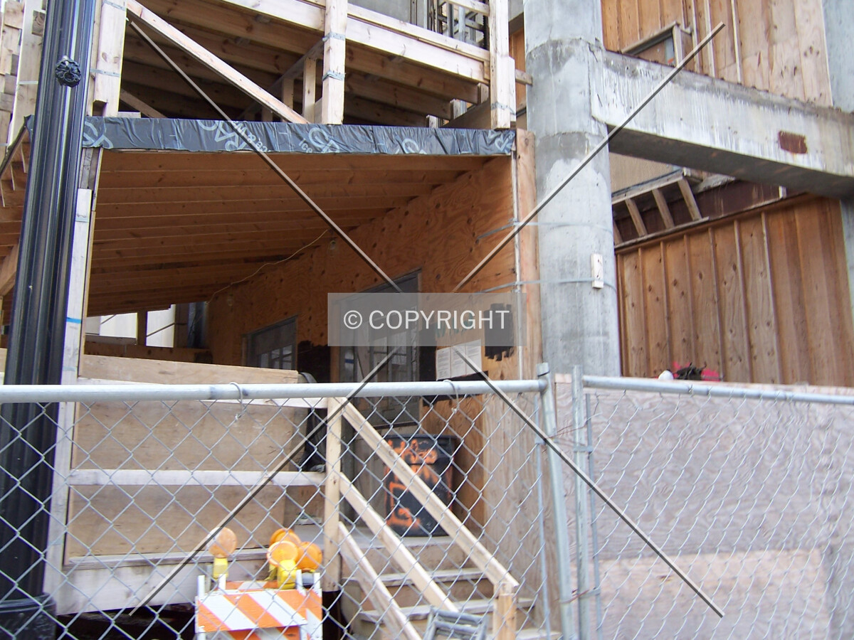 Northeast corner of the building’s base, and the loading platform of the construction elevators