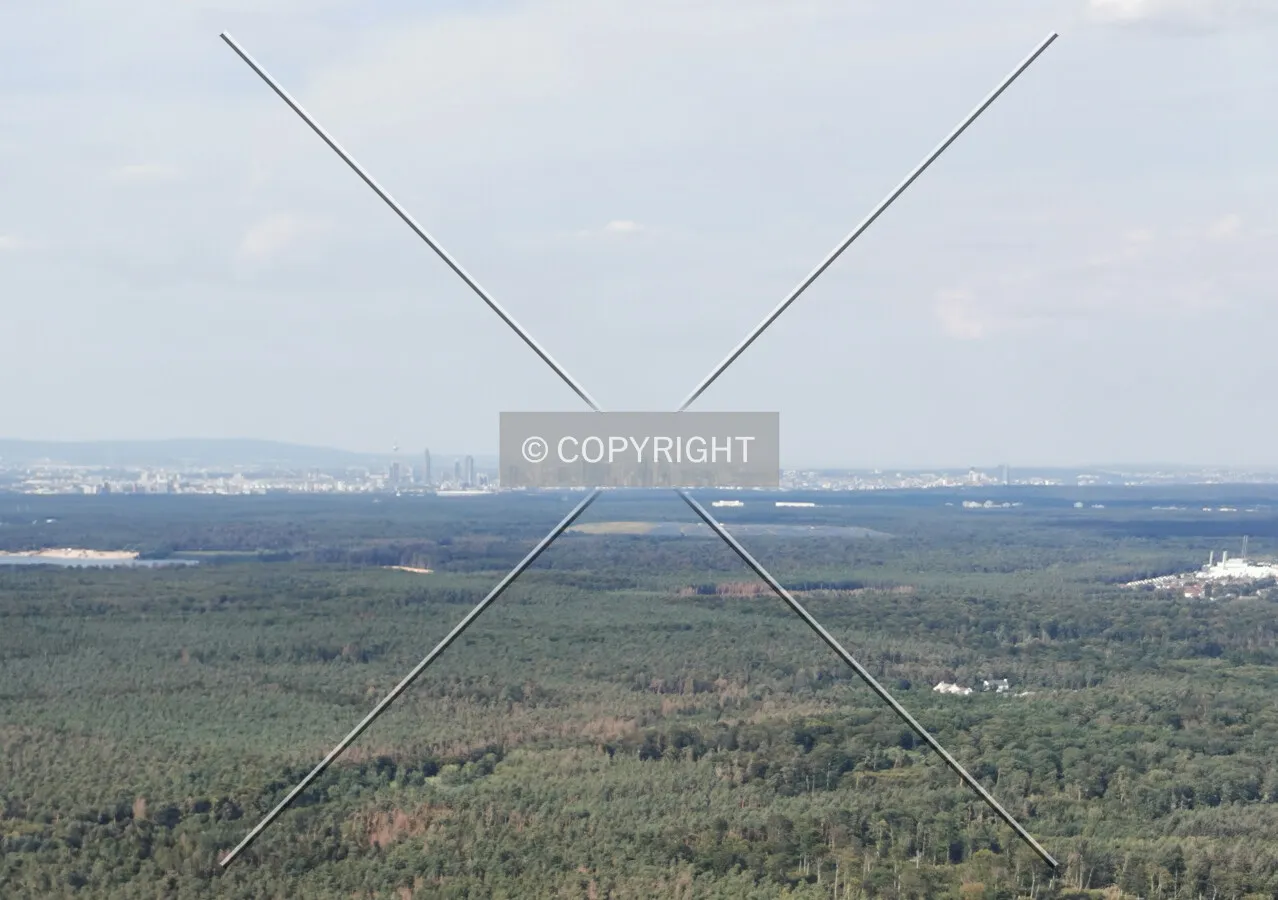 Flight with a helicopter from Egelsbach to Frankfurt - the skyline of Frankfurt in the far distance