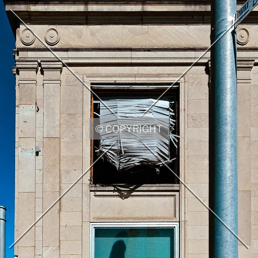 From the east, with broken windows from the previous afternoon\\\'s EF3 tornado, Saturday, May 17, 2025