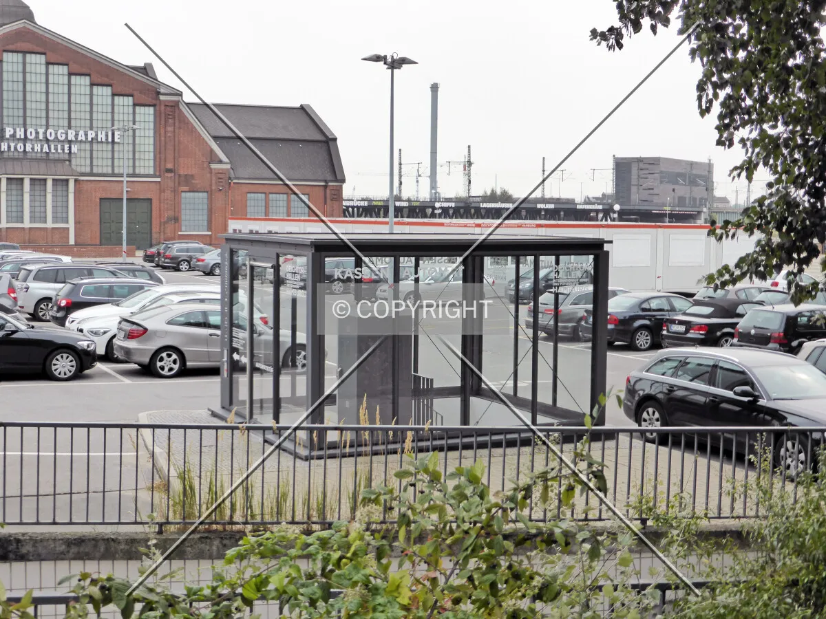 Ticket machine in the center of the parking lot