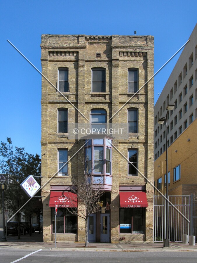Full front elevation from across 1st Street North