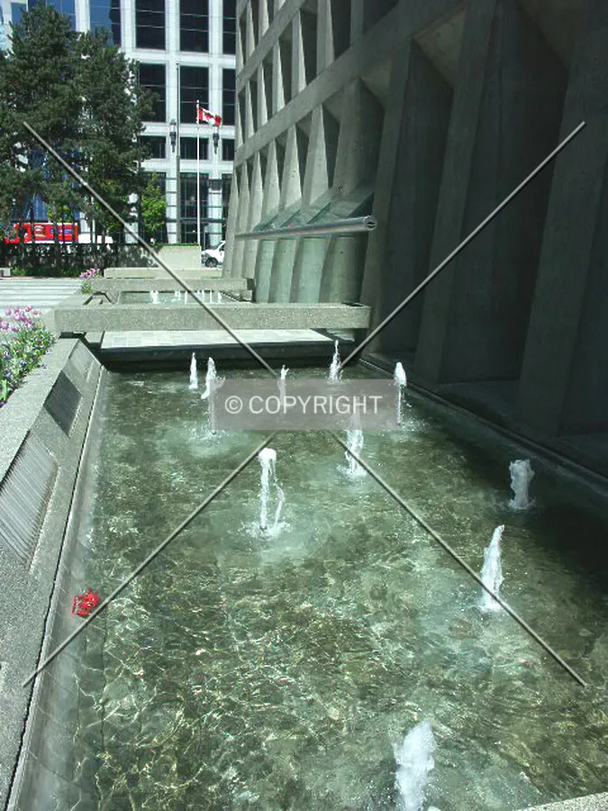 Fountains grace the base of the building