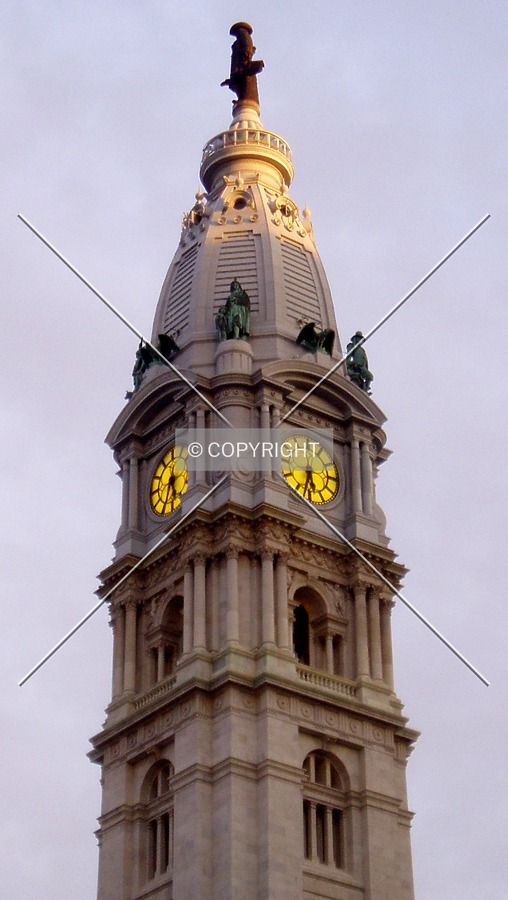 The tower, clock, observation floor, and statue of William Penn, from the northwest