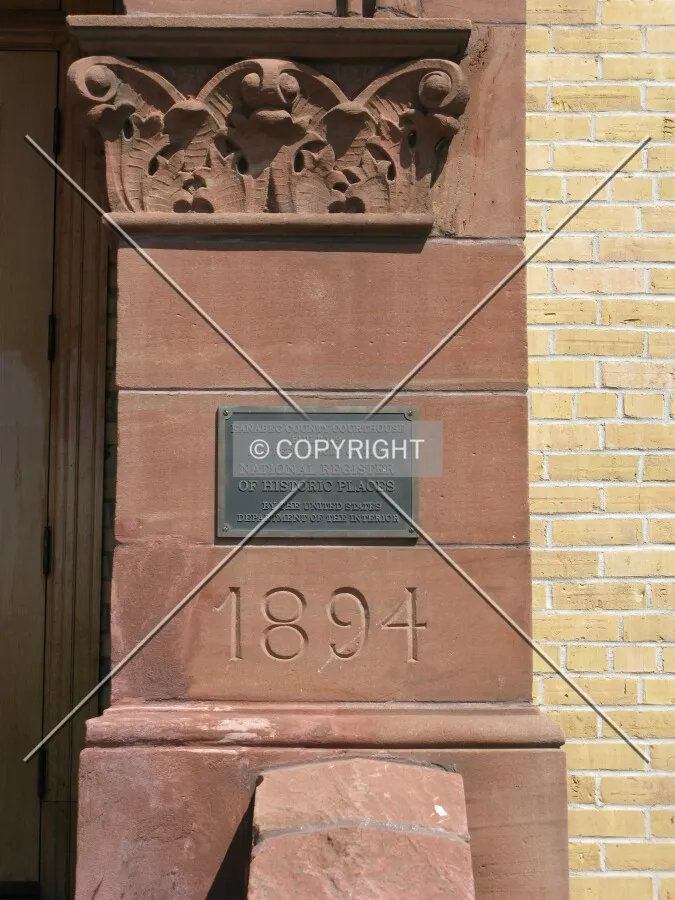 Cornerstone and National Register plaque on Lake Superior sandstone