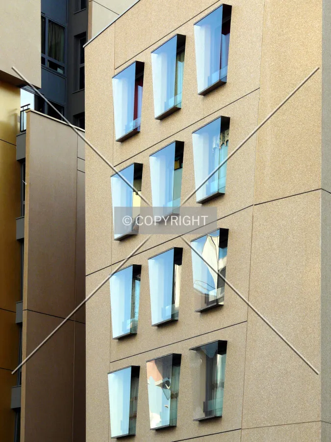 Facade detail of the low-rise portion at the north corner of the site