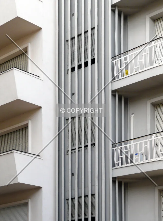 Concrete white bands on the west facade