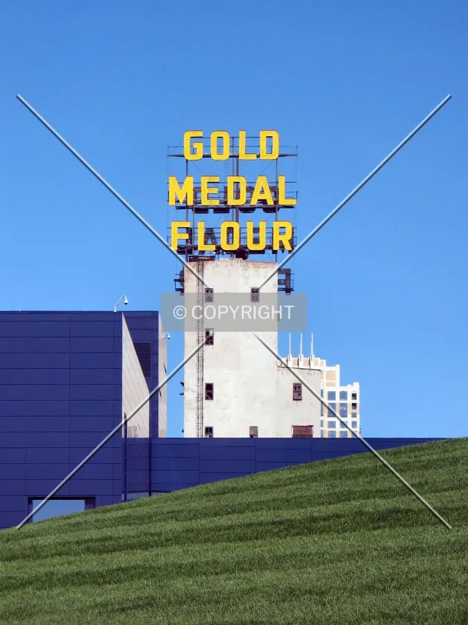 The iconic sign looming over the Guthrie Theatre's Endless Bridge, from Gold Medal Park