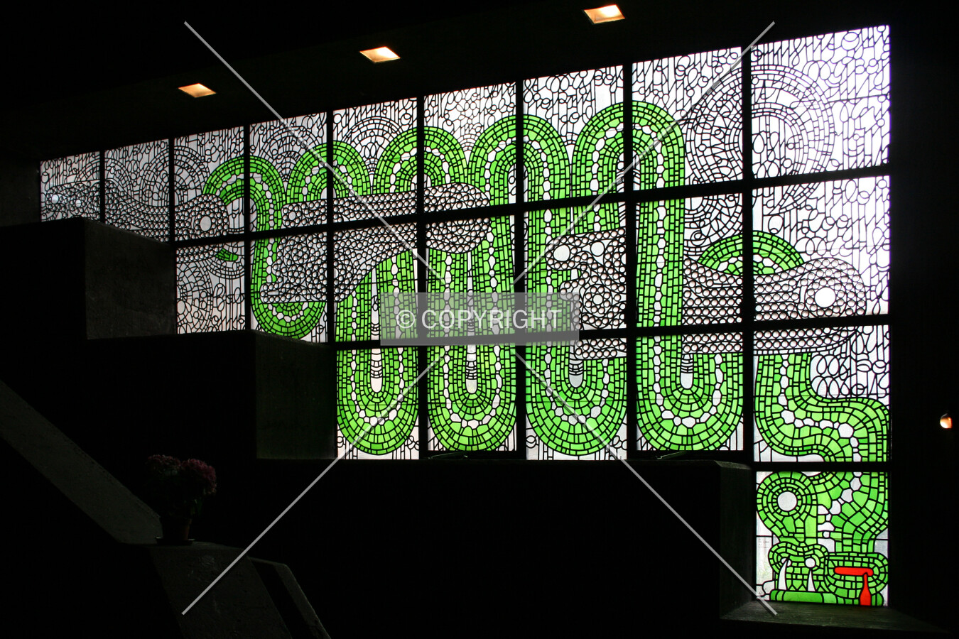 Stained glass window depicting a snake