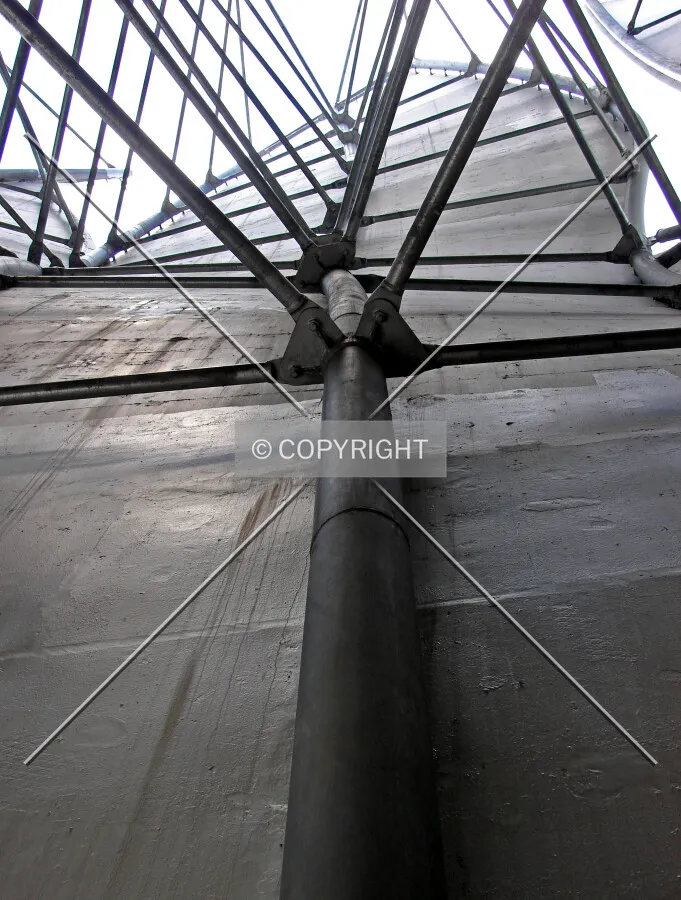View of reinforcement system between one of the undulating facade panels