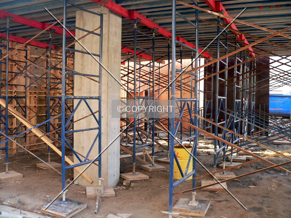 View through the main level with scaffolding visible