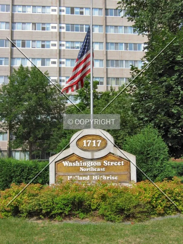 Building sign and flag at Washington Street/17th Avenue NE