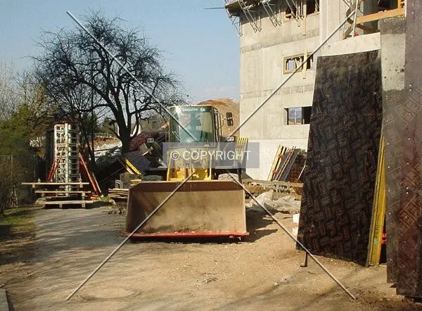 Front end loader on construction site