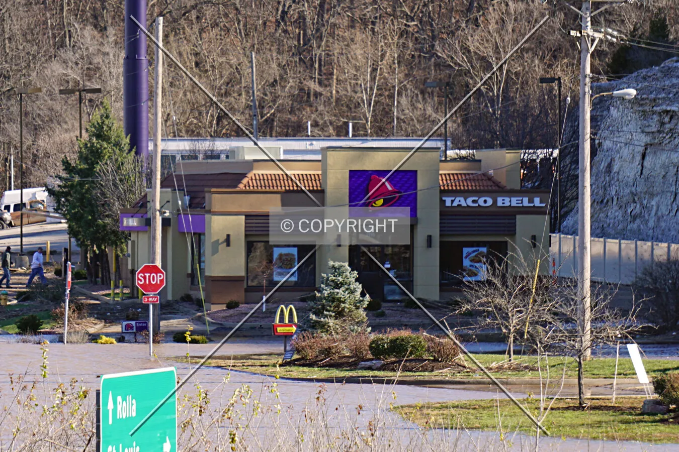 Distant view from the west as workers begin cleanup after the Meramec River flood; January 1, 2016