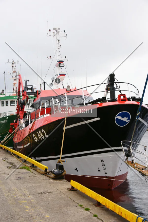 A boat is moored in a port