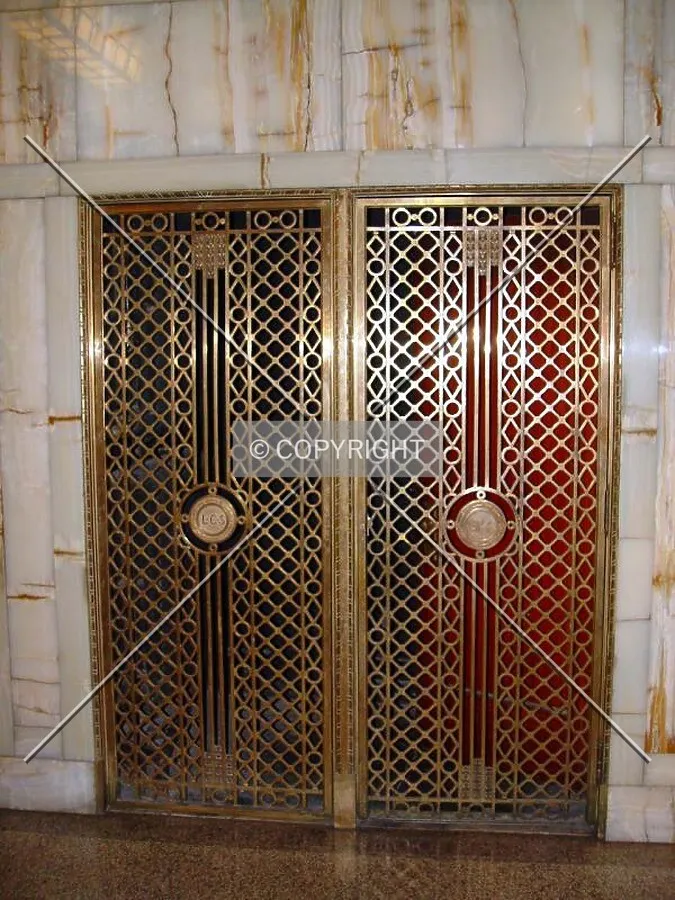 Brass and marble gateway to the ride up
