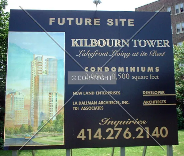 Promotional billboard with rendering of the never-built first scheme