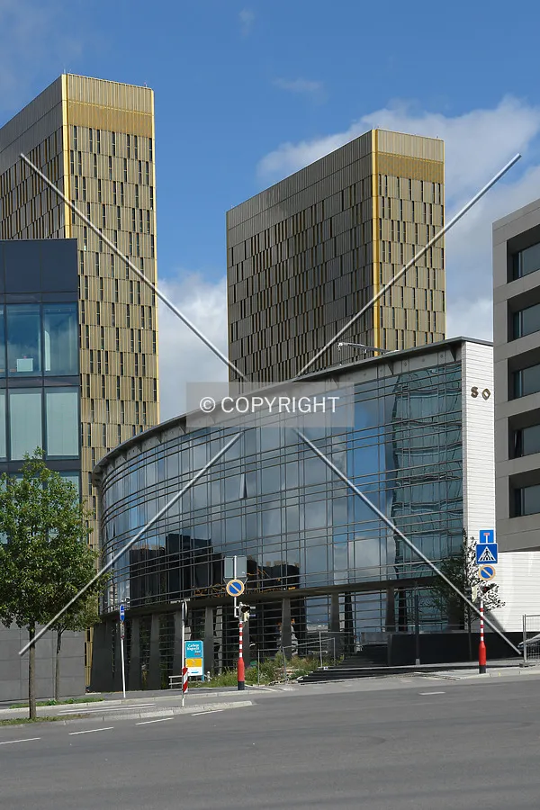 As seen from far away with Sofitel Hotel in the foreground