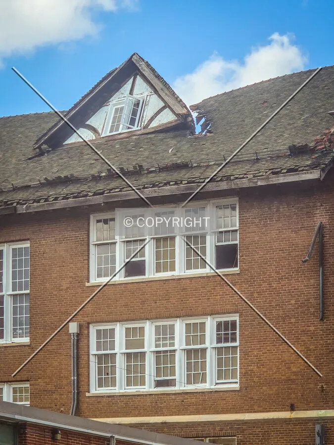 Roof collapsing on the west facade, Sunday, June 28, 2026