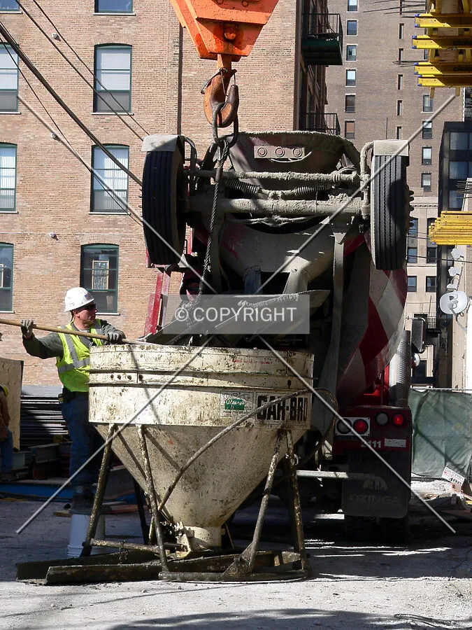 Loading a bucket of concrete