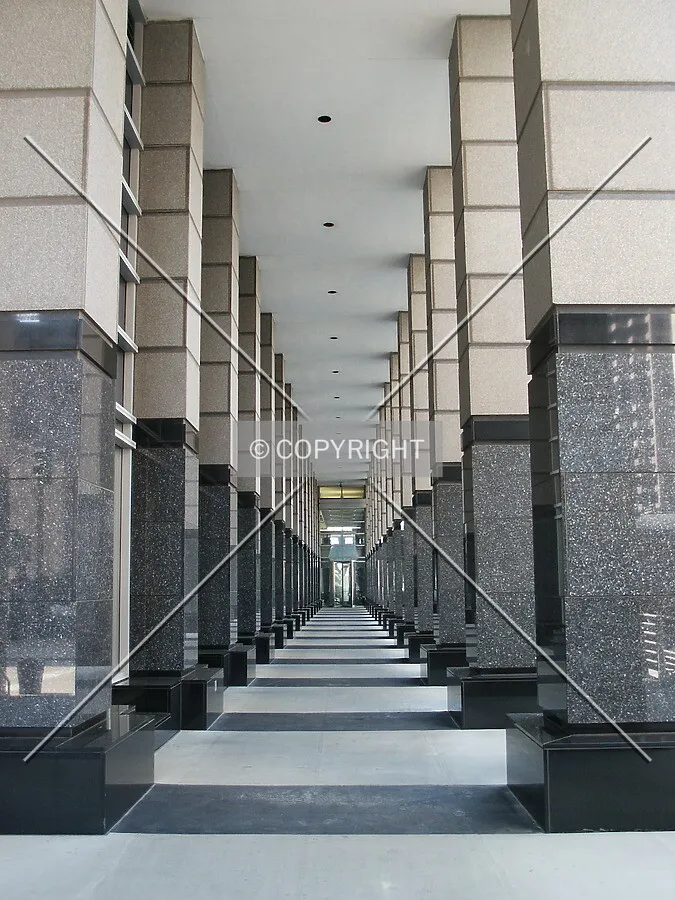 Colonnaded walkway between Washington and the lobby