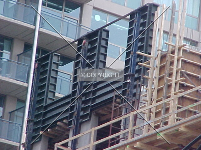 Metal formwork alongside wood formwork