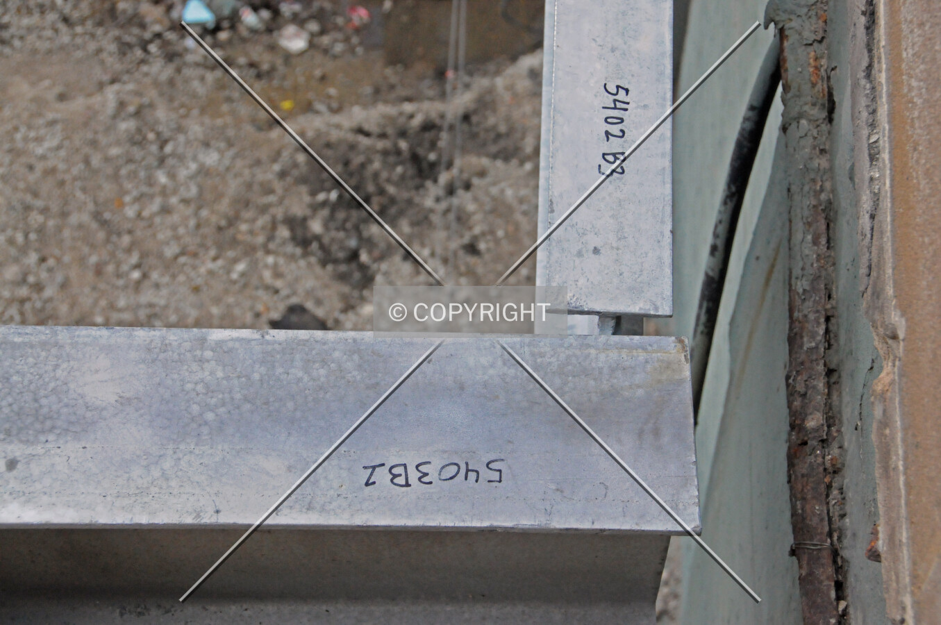 Beams to support the pedestrian walkway's deck at Wells Street