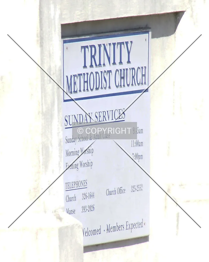 Sign showing opening praying times